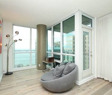 Beautiful 2 Bed, 2 Bath with Balcony and Gorgeous Upscale Decor - Photo 1