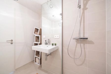 1,5 ZIMMER | BALKON | VIENNA TWENTYTWO | ERSTBEZUG IN DER NEUEN DONAUSTAT | MIETBEGINN AB 1. APRIL - Photo 3