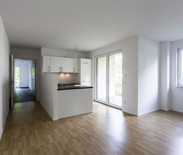 Traumhafte Familienwohnung in grüner Wohnanlage - Photo 1