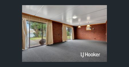 UPDATED 3 BR HOME WITH HUGE RUMPUS ROOM, & HEAT & COOL! - Photo 2