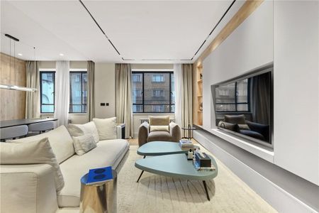 Finished to a high standard, this furnished apartment is located within a sought-after portered building on the prestigious Portland Place in Marylebone. - Photo 2