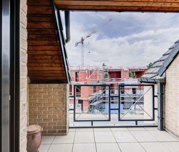 DUPLEXAPPARTEMENT MET 2 SLAAPKAMERS, 2 TERRASSEN EN GARAGEBOX AAN H... - Photo 4