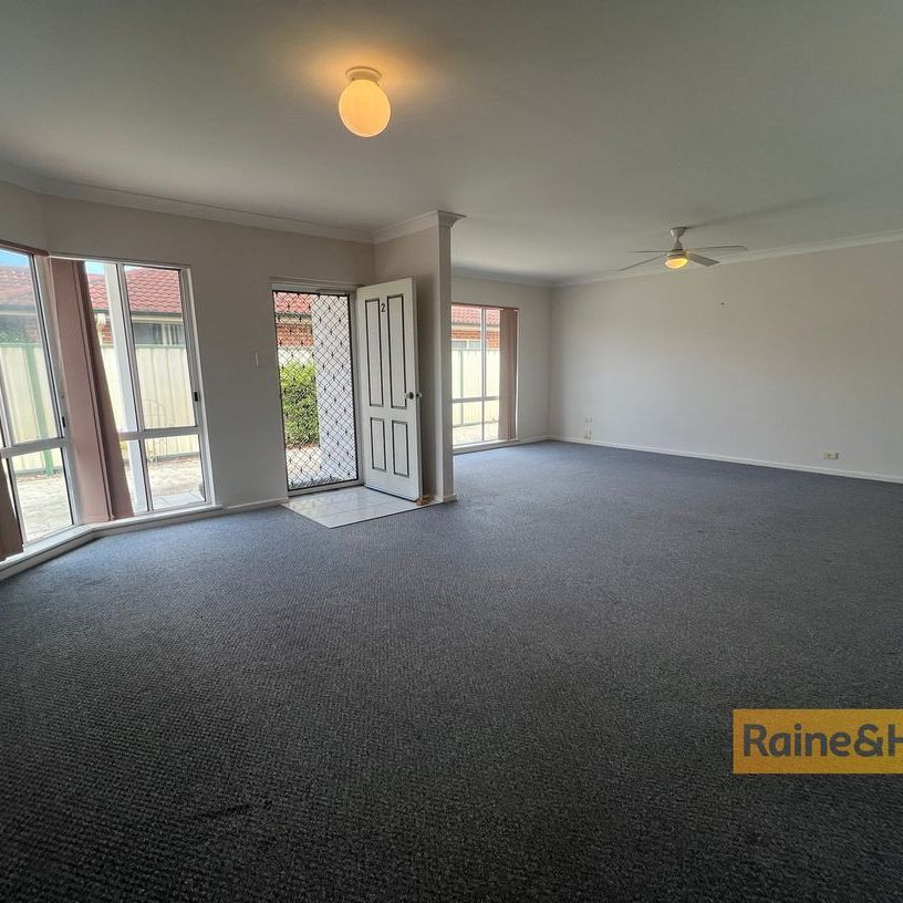 THREE BEDROOM VILLA IN THE HEART OF ETTALONG BEACH - Photo 1