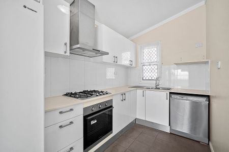 Three-Bedroom Home with Spacious Backyard - Photo 3