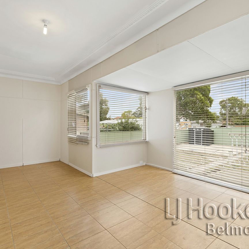 Freshly Painted Three Bedroom Home in Convenient Location! - Photo 1