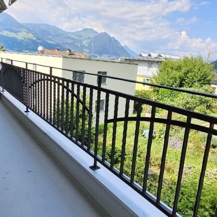 Wohnung mit Weitsicht auf umliegende Berge und Seeblick - Foto 1