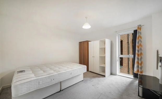 Contemporary Two-Bedroom Apartment with Balcony and Secure Parking - Photo 1