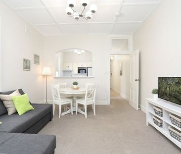 APARTMENT RICH IN HERITAGE CHARM | Furnished - Photo 1