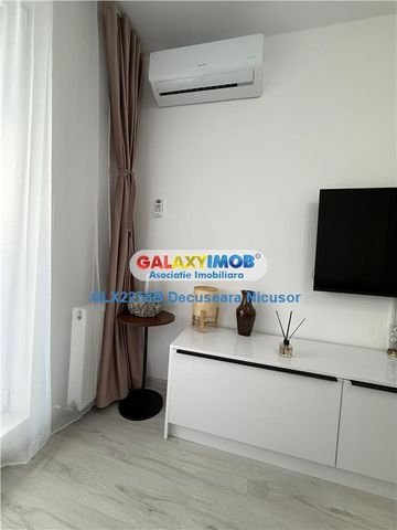Garsoniera mobilata si utilata Militari Residence 400 euro - Fotografie 2