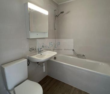 Renovated 3-room apartment with garden - Photo 1