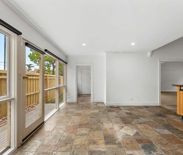 Spacious Three-Bedroom Home with Exceptional Convenience - Photo 1