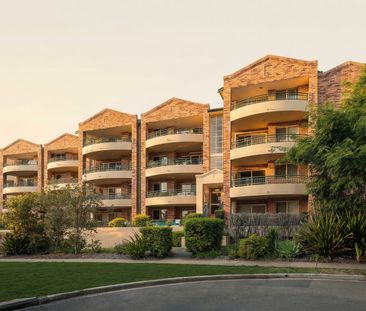 Charming Brick Apartment with Scenic Balconies - Photo 1