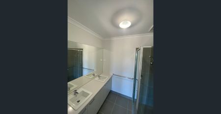 Modern 4-Bedroom Home in a Peaceful Estate - Photo 5