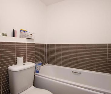 Welcome to this charming 4-bedroom townhouse nestled on Wood St in ... - Photo 2