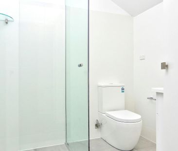 Stylish, Renovated Tri-Level Townhouse - Photo 6