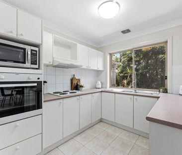 Convenient, Light Filled Abode - Photo 5