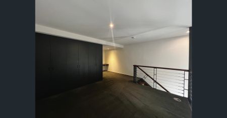 Stylish one-bedroom loft in prestigious SY21 development - Photo 3