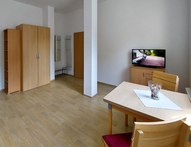 Tolle möblierte Single-Wohnung mit perfekter Verkehrsanbindung! - Foto 1