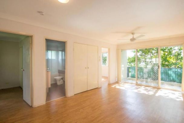 Light-Filled Two-Bedroom Unit with Breezy Balcony in Convenient Location - Photo 1