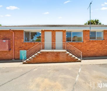 Renovated 2 bedroom units close to town - Photo 4