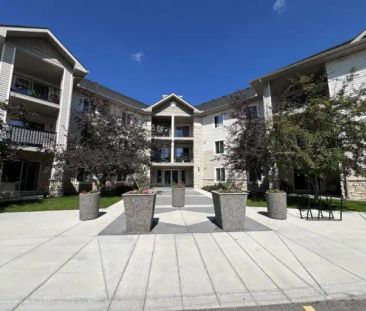 1-Bed/1-Bath Condo — Utilities + Heated Parking Included | Evergree... - Photo 1