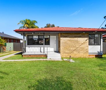 RENOVATED THREE BEDROOM HOME! - Photo 6