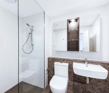 Northeast Facing One Bedroom with Media Desk and Parking! - Photo 4