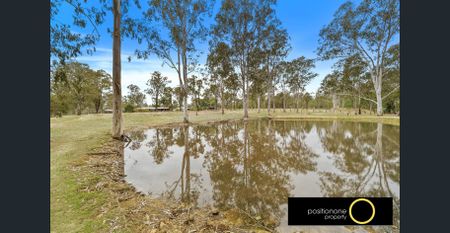 Beautiful Home with Bonus Granny Flat and Horse-Riding Arena in Jimboomba, QLD! - Photo 2