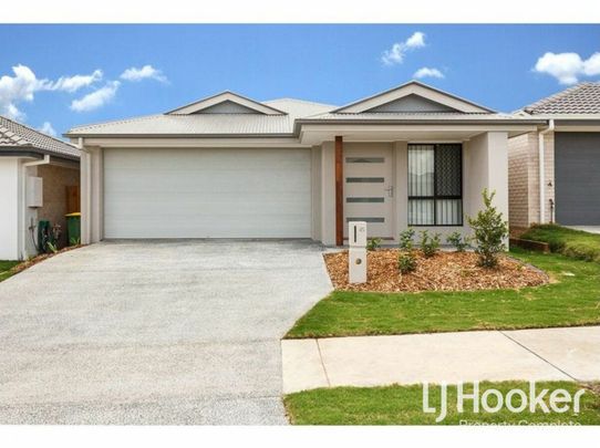 Modern Family Home with Stylish Finishes & Low-Maintenance Living - Photo 1