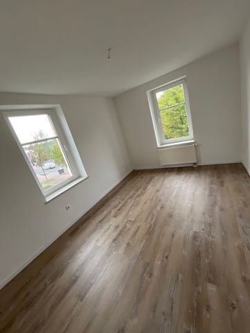 Praktische Singlewohnung mit moderner Einbauküche und Balkon! - Foto 3