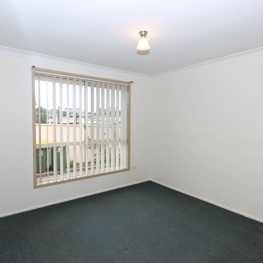 Two Bedroom Unit in Great Location - Photo 1