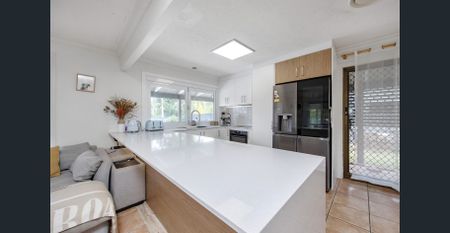 Stunning Family Home in Oxenford with Pool and Spacious Yard - Photo 3