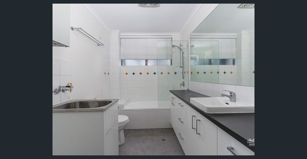 RECENTLY RENOVATED - LOCK UP GARAGE - POOL IN COMPLEX - Photo 1