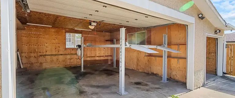 Oversized Double Garage with four post Hoist Car Lift- Mechanics Dream Workshop | Calgary - Photo 1