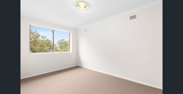 North Facing Two Bedroom Unit with Parking - Photo 1