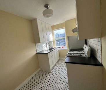 Freshly Painted 1 Bed Suite in Fully Restored Heritage Building - Photo 4