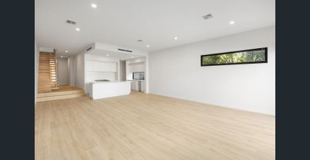 This luxurious brand new townhouse will exceed all your expectations. - Photo 2