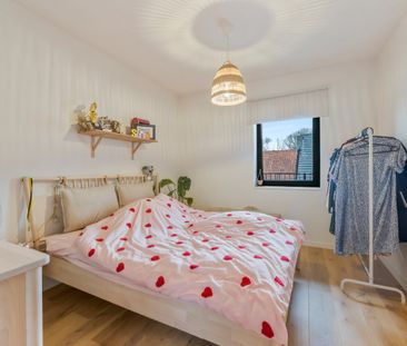 Nieuwbouwappartement met zonnig terras in hartje Steendorp - Photo 6