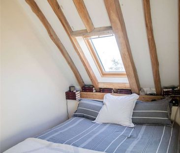 A beautifully presented 4-bedroom barn conversion with gated entran... - Photo 6