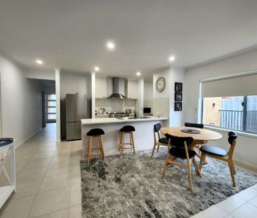 CHARMING FAMILY HOME WITH MODERN FEATURES AND SPACIOUS YARD - Photo 6