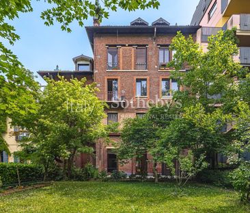 Elegante appartamento con giardino - Photo 5