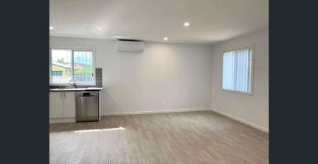 Modern & Secure Two-Bedroom Home in Prime Location - Photo 2