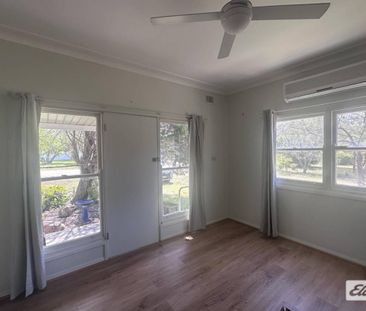 Rural home in the heart of town - Photo 1