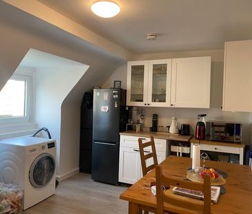 Gemütliche Dachgeschosswohnung mit Schrägen - Foto 1