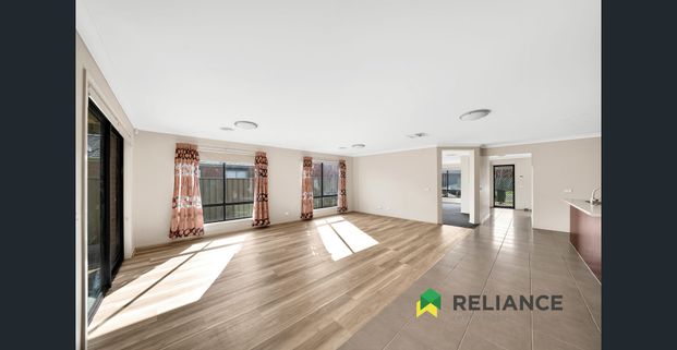 Spacious 4-Bedroom Family Home with Dual Living Areas! - Photo 1