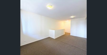 Level 6 Split-level large one bed opposite the East Village Shopping Centre - Photo 2