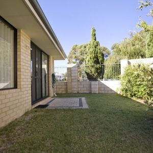 Ideally Located for easy care living - Photo 2