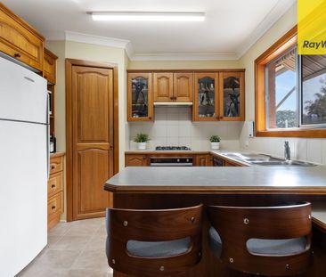 Spacious High-Set Brick Home with Pool & Entertaining - Photo 3