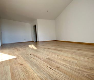 Helle 2-Zimmer-Dachgeschosswohnung in Leipzig-Mölkau - inklusive TG... - Foto 1