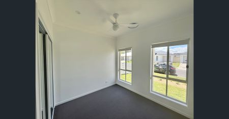 Brand New with Ducted Aircon! - Photo 2